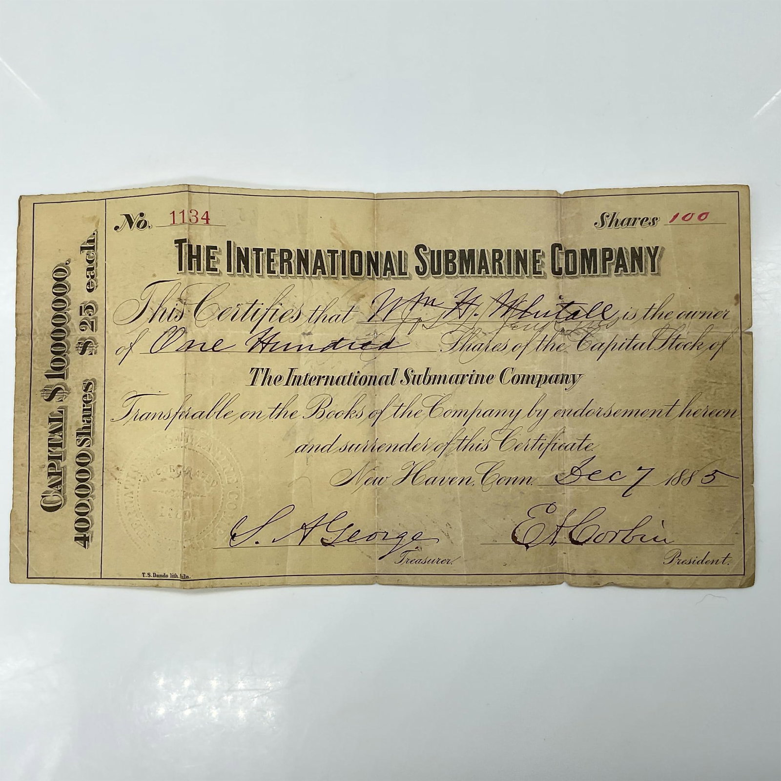 Antique International Submarine Company Stock Certificate: Certificate of 100 shares in the International Submarine Company. Hand-signed paper with an embossed seal of the company. Issued: 1885 Dimensions: 9.75"L x 5.25"W