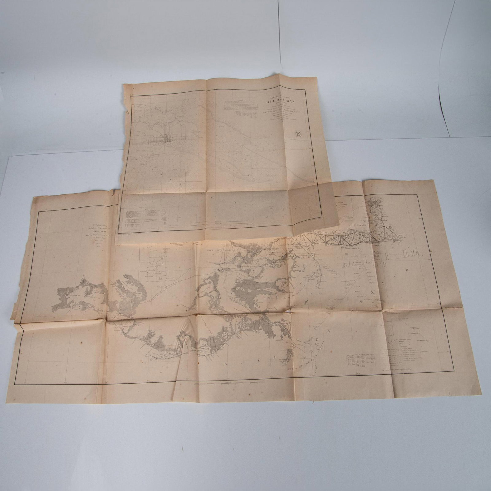 TWO ORIGINAL ENGRAVINGS SURVEYS MAPS MISSISSIPPI: Two antique original maps engravings of a Survey of Biloxi Bay in Mississippi. Dimensions: 19"L x 16"H. It also includes a Survey of Louisiana and the Gulf of Mexico. Dimensions: 35"L x 17.5"H Issued: