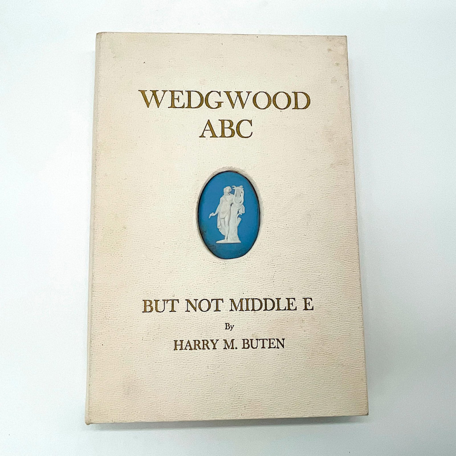Hardcover Book, Wedgwood ABC, But Not Middle E Signed: Signed by Harry M. Buten; deluxe edition with a Wedgwood Erato medallion on the cover. Depth: 1in. 112 pages. This item has no reserve. Artist: Harry M. Buten Issued: 1964 Dimensions: 7.25"W x 10.5"H 