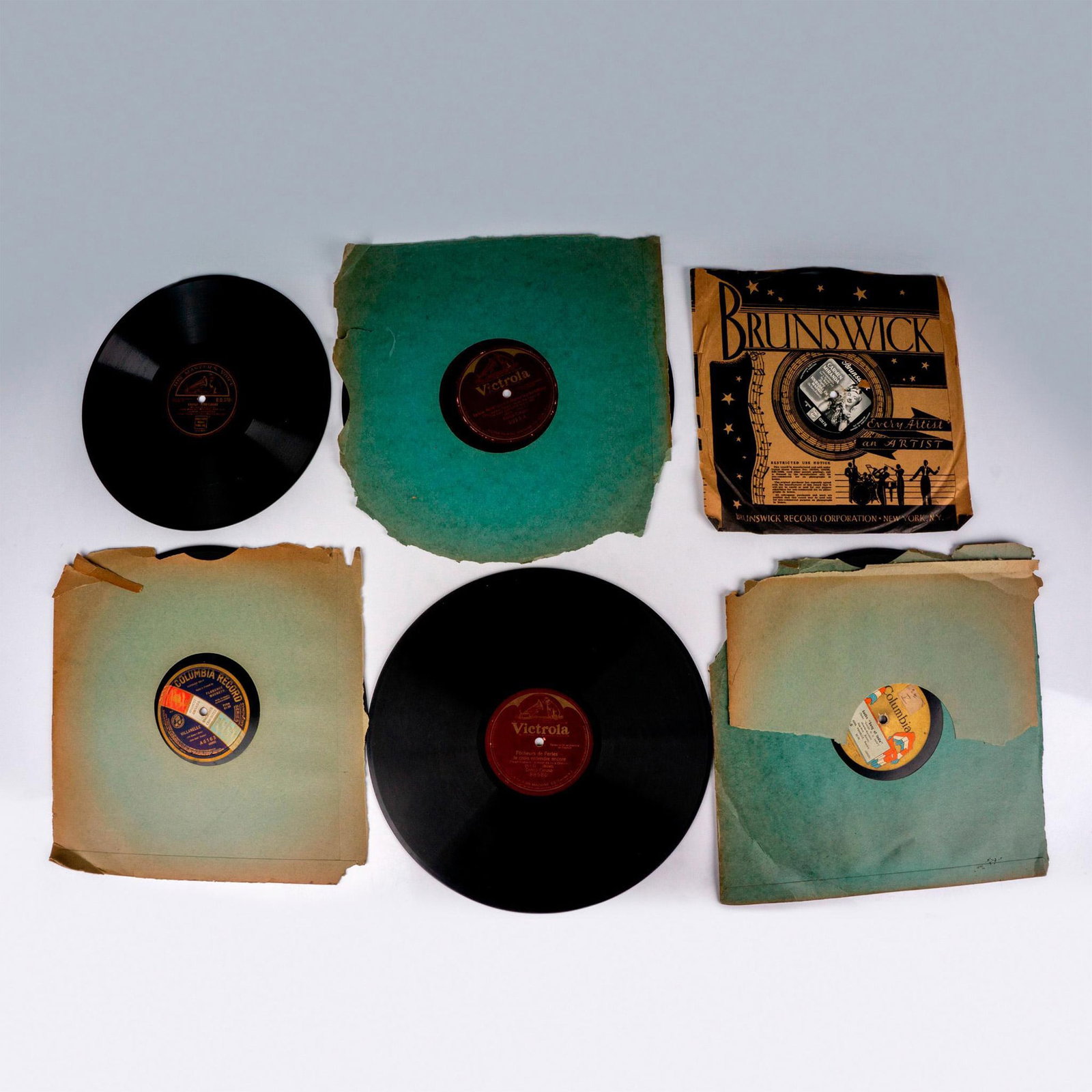 6 Vintage 10-Inch and 12-Inch International Vinyl Records: An assortment of music records from various languages or orchestra. Such as Villanelle sang in French by Florence Macbeth, Babalu-Afro-Cubano by Don Marino Barreto and his Cuban orchestra, Touradas Em