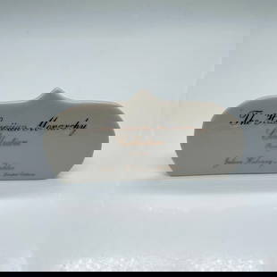 Julene Mechler The Hawaiian Monarchy Collection Plaque: A cream-colored porcelain table sign with gilt text. Made for Julene Mechler's hand made limited edition The Hawaiian Monarchy Collection figurines. Issued: 20th century Dimensions: 5.25"L x 0.75"W