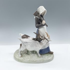 Royal Copenhagen Figurine, Girl Walking with Goats 694