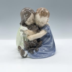 Royal Copenhagen Figurine, Two Children with Dog 707