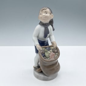 Royal Copenhagen Figurine, Boy with Sack of Gifts 4534