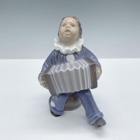 Royal Copenhagen Figurine, Child with Accordion 3667