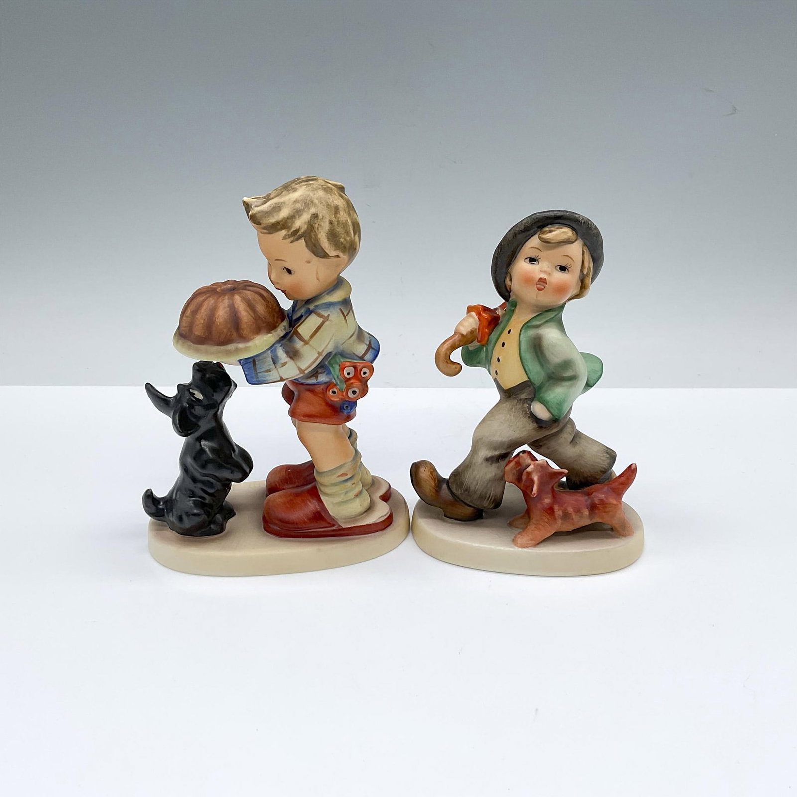 2pc Goebel Figurines, Begging His Share and Strolling Along (1 of 3)