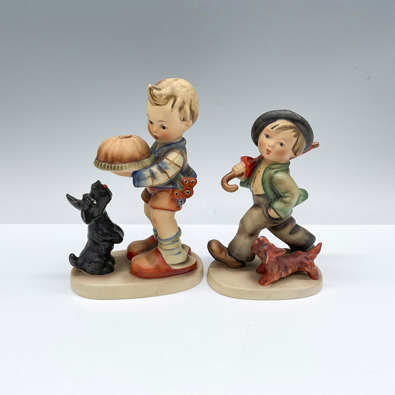 2pc Goebel Figurines, Begging His Share and Strolling Along (1 of 3)