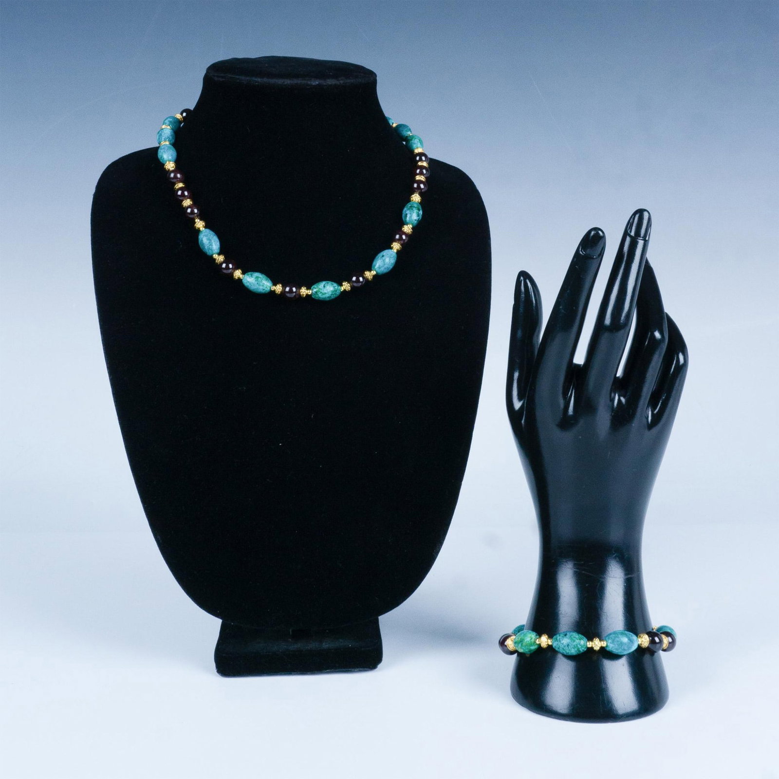 2pc Bohemian Chrysocolla Garnet Bead Necklace & Bracelet: This beautiful set features chrysocolla and garnet beads with gold tone clasps and spacers. The bracelet measures 9.25"L end to end, but can be adjusted shorter. The necklace measures 22"L end to end,