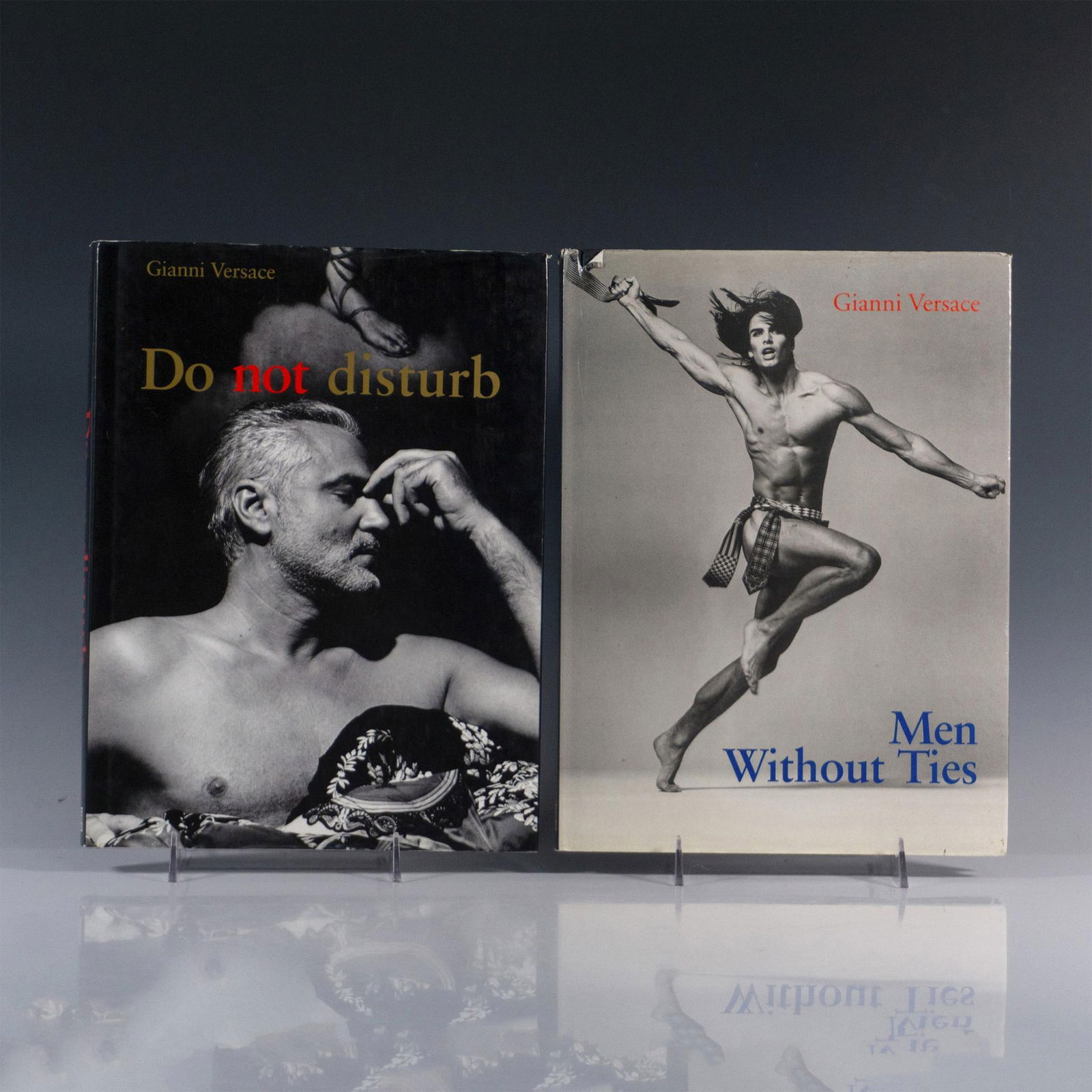 2 Books Gianni Versace Erotic Art Photography Books: A pair of coffee table books depicting clothing fashion design and interior home design elements in the highly unique Versace neo-classic style, featuring nude male and female models in intense and ar