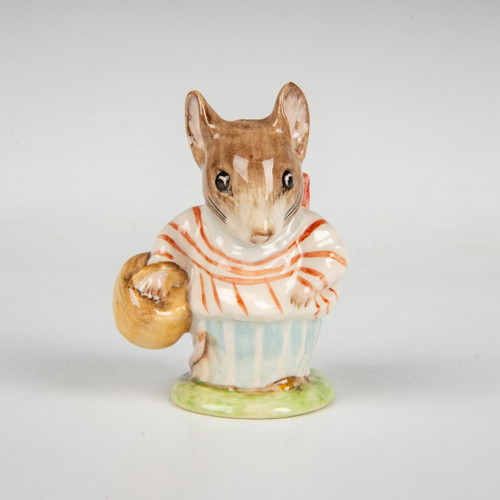 Beswick Beatrix Potter Figurine, Mrs. Tittlemouse: Modeled with red and white striped blouse and blue and white striped dress. This item has its original box measuring 2"L x 2.75"W x 5"H. Beswick backstamp. Artist: Arthur Gredington Issued: 1948-1993
