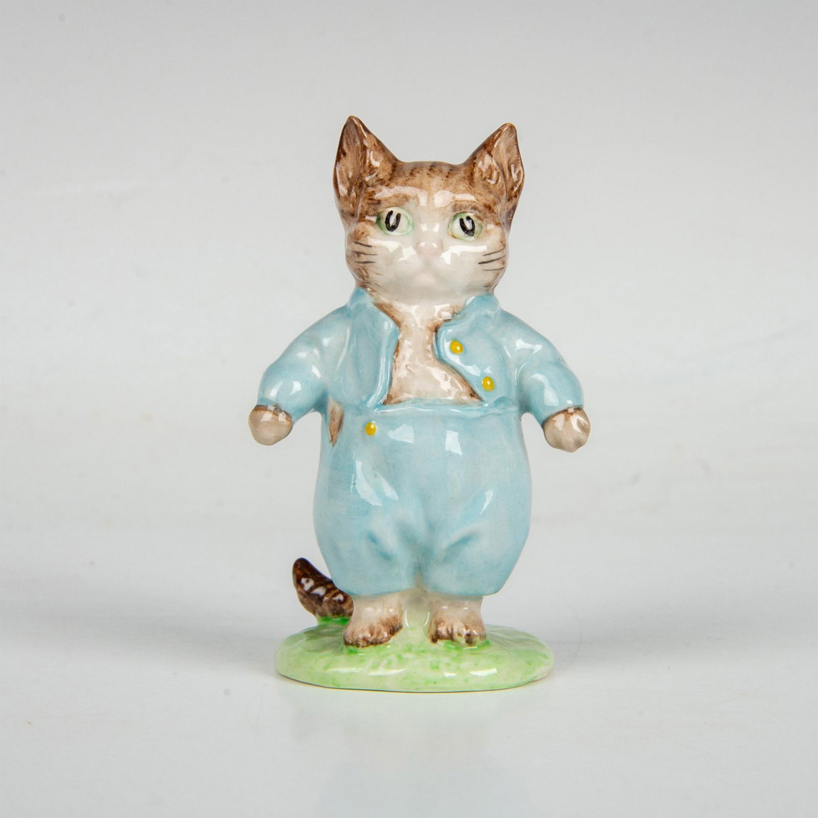 Beswick Beatrix Potter Figurine, Tom Kitten: Adorable character modeled in soft blue clothes. Includes the original box, dimensions: 2''W x 2.75''W x 5''H. Beswick Beatrix Potter backstamp. Artist: Arthur Gredington Issued: 1948 - 1980 Dimension