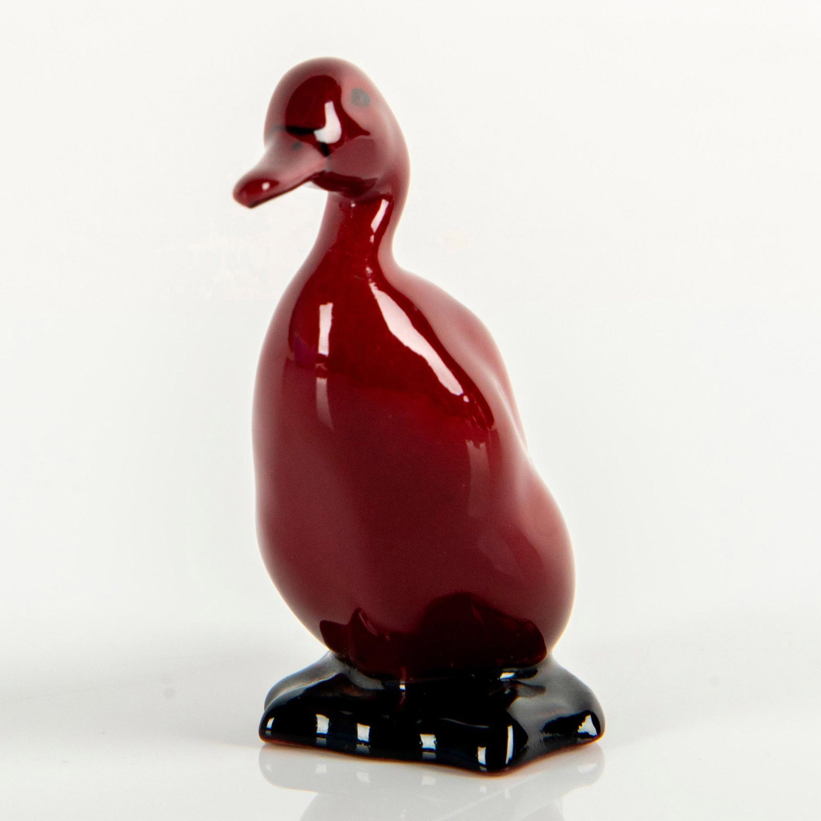Royal Doulton Flambe Figurine, Drake, Standing HN807: Model number 395. Rich red flambe glaze with black accents. Royal Doulton backstamp. #flambe #duck Issued: 1922 - 1996 Dimensions: 2.5"H Manufacturer: Royal Doulton Country of Origin: England