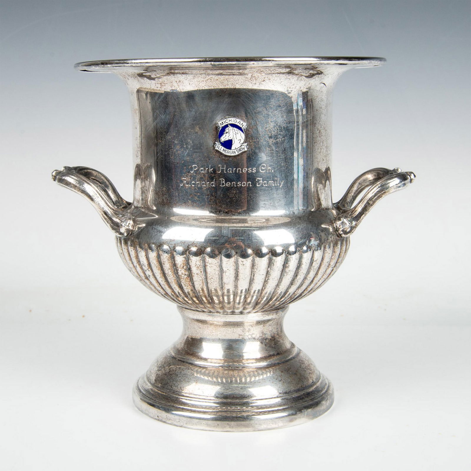 Silverplate Loving Cup Horse Trophy: This beautiful trophy is engraved with Park Harness Ch. Richard Benson Family and features an emblem on the front reading Michigan All Morgan Show. Unmarked as to maker. Dimensions: 10"L x 10"H