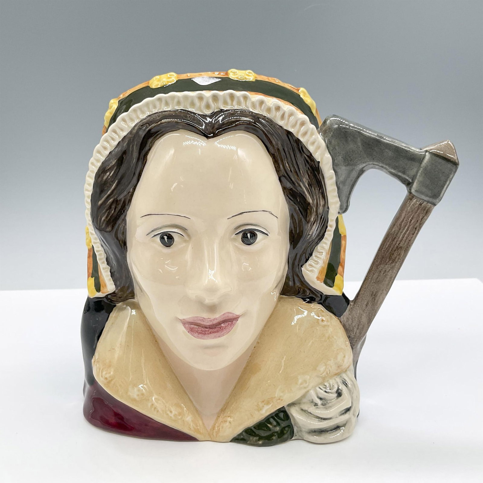 Catherine Howard D6645 - Large - Royal Doulton Character Jug: Style One. Brown, gold, and white coloration. Royal Doulton backstamp. Artist: Peter Gee Issued: 1978 - 1989 Dimensions: 7"H Manufacturer: Royal Doulton Country of Origin: England