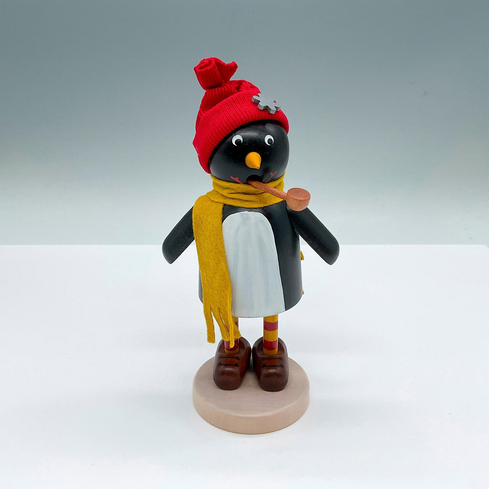 Christian Ulbricht German Wooden Incense Burner, Penguin: Handcrafted and hand painted Christmas smoker penguin. The body is pulled up to detach from the legs, which reveals the place to hold the incense. Christian Ulbricht sticker on the underside. This ite