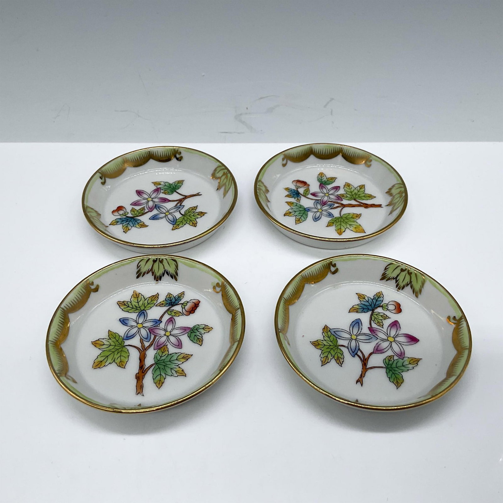 Thieme Potschappel Dresden Pink Mini Cup and Saucer: Miniature children size set, features a floral design with a courting couple adorned with gilded accents. Dresden backstamp. Issued: c. 1881 - 1901 Dimensions: Cup: 2.5''L x 1.75''W x 1.5''H; Saucer: 