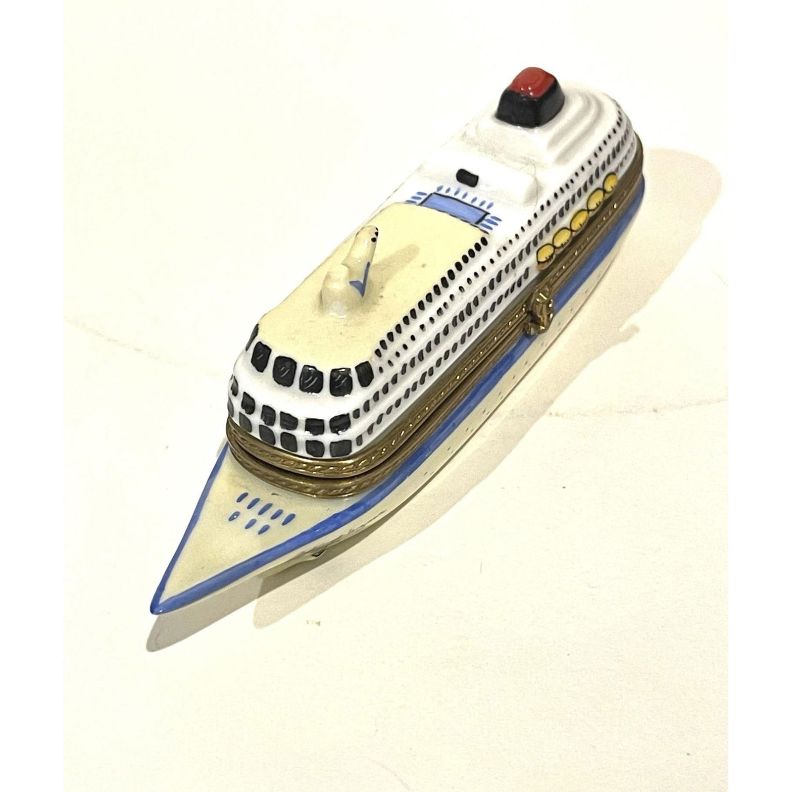 Rare Limoges France Keepsake Box, Cruise Ship Cote d Azur: This rare cruise ship with a red and black smokestack swimming pool. Plethora of portholes. Anchors on each side of the bow has Cote d Azure written on both sides with a gilded anchor clasp opens to r