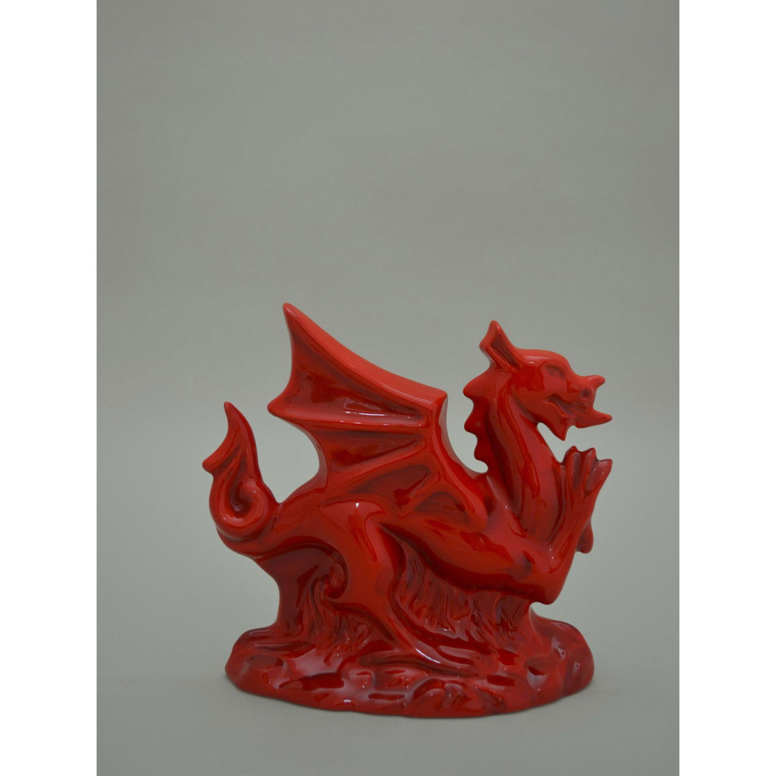 Royal Doulton The Welsh Dragon Sculpture: Glazed, hand created, hand painted, featuring The Welsh Dragon Figurine.Beautiful color variations of Red Glazing. Exclusively created for Yesterday's Doulton Backstage. Hallmark: Authentic Royal Doul