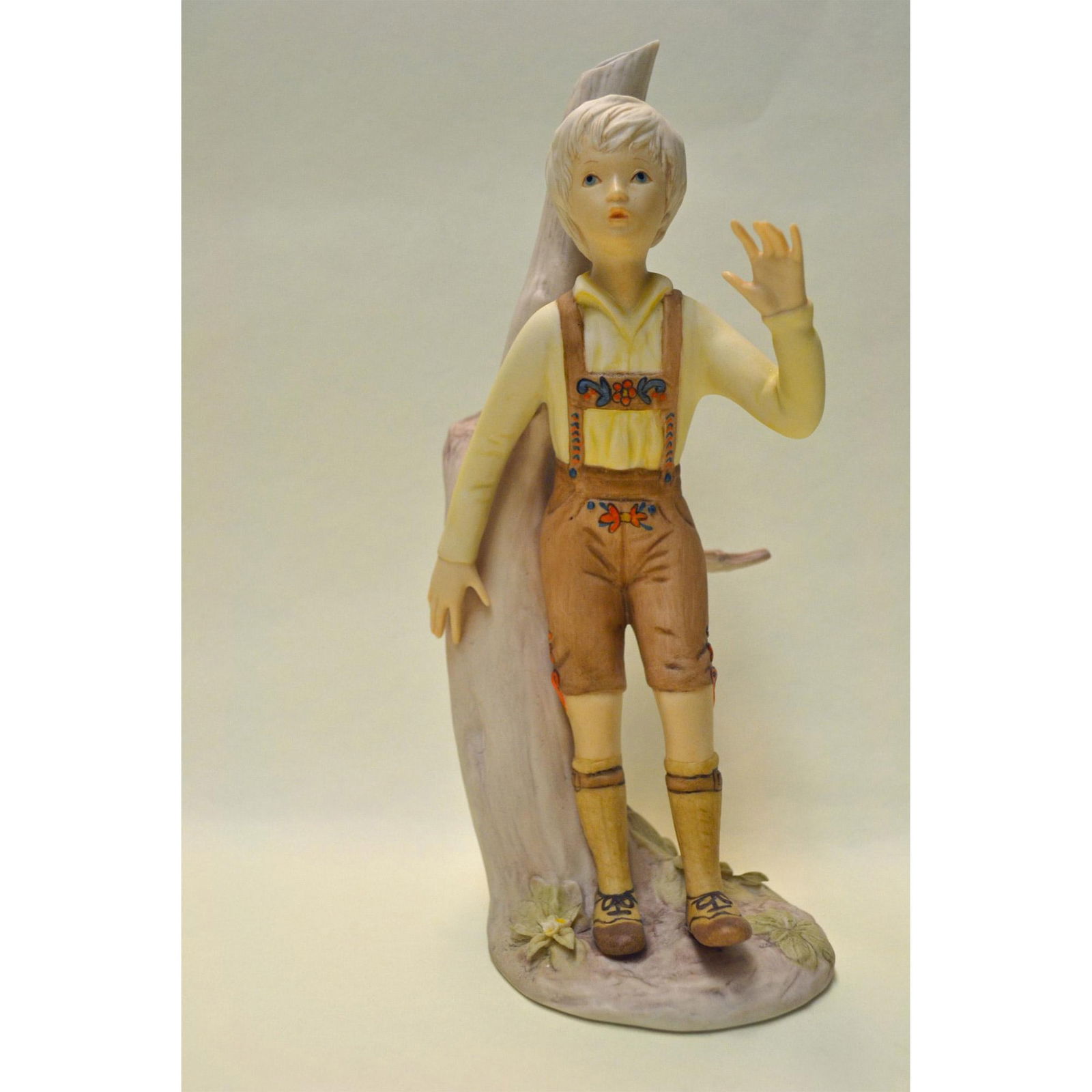 Cybis Porcelain Hansel Figurine: Bisque Porcelain Decorated, hand created, hand painted by the Artists of the Cybis Studios. Featuring Hansel, from the Children to Cherish Collection. Design Number: 475. Authentic Backstamp on the un