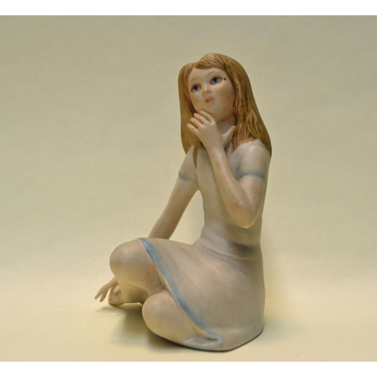 Cybis Porcelain Thumbelina Figurine: Bisque Porcelain Decorated, hand created, hand painted by the Artists of the Cybis Studios. Early and Rare, introduced in 1957, featuring Thumbelina seated, barefooted. Design Number: 434. Authentic B