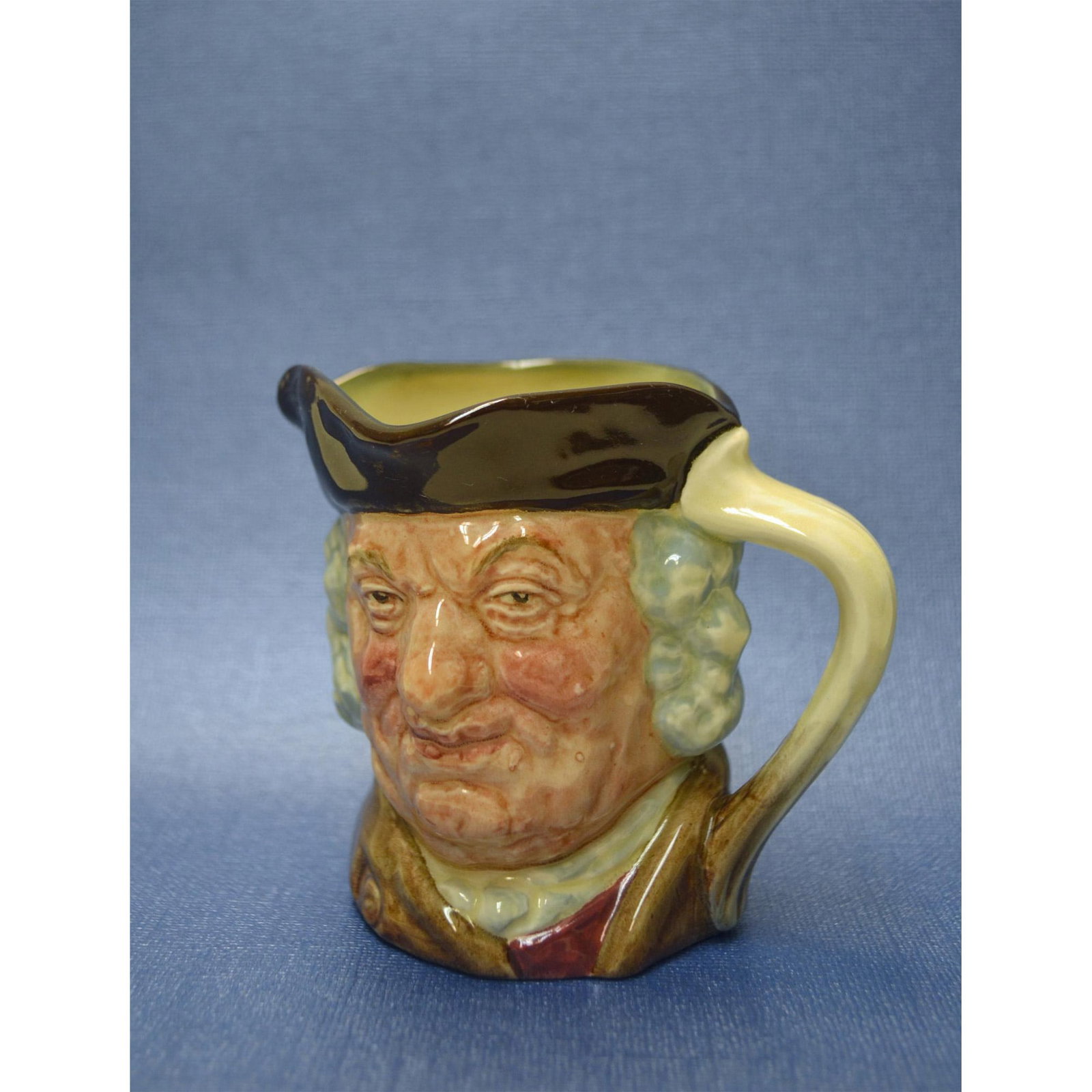 Royal Doulton Porcelain Sam Johnson Mug, 1949: Glazed Porcelain Decorated, hand created, hand painted. Featuring the Sam Johnson Mug. Introduced in 1949 by Doulton & Co. Vintage. Nice detail. Hallmark: RN: 857579 Authentic Backstamp on the undersi