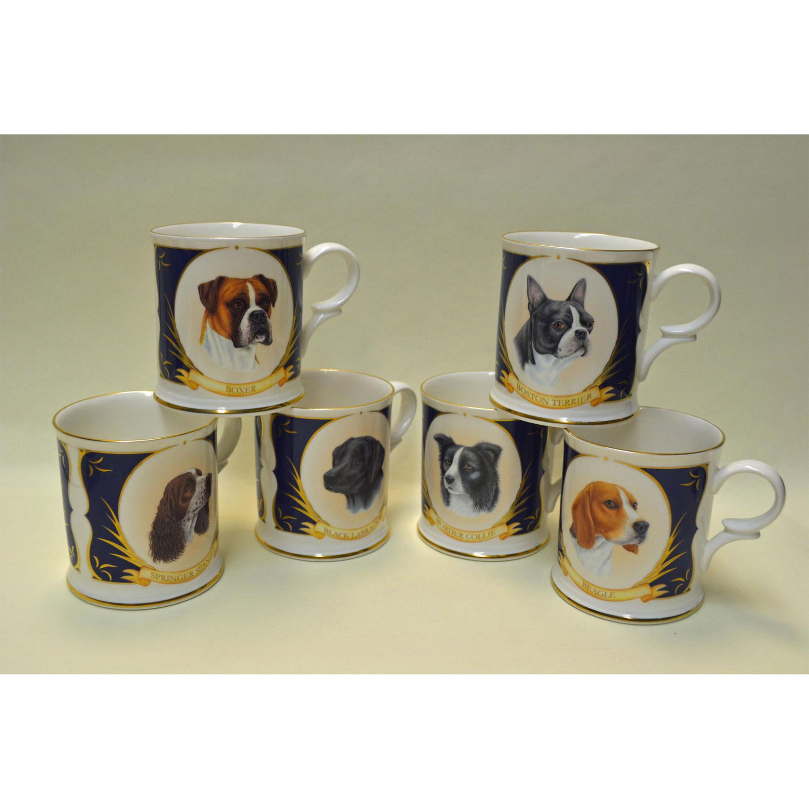 6Pc Royale Stratford Porcelain Dog Mugs: Fine Bone China, Glazed Decorated, hand made, hand painted by the Artisans of the Royale Stratford Studio, Staffordshire, England. A Collection of Six (6) Decorated Mugs featuring the Boxer, Beagle, B