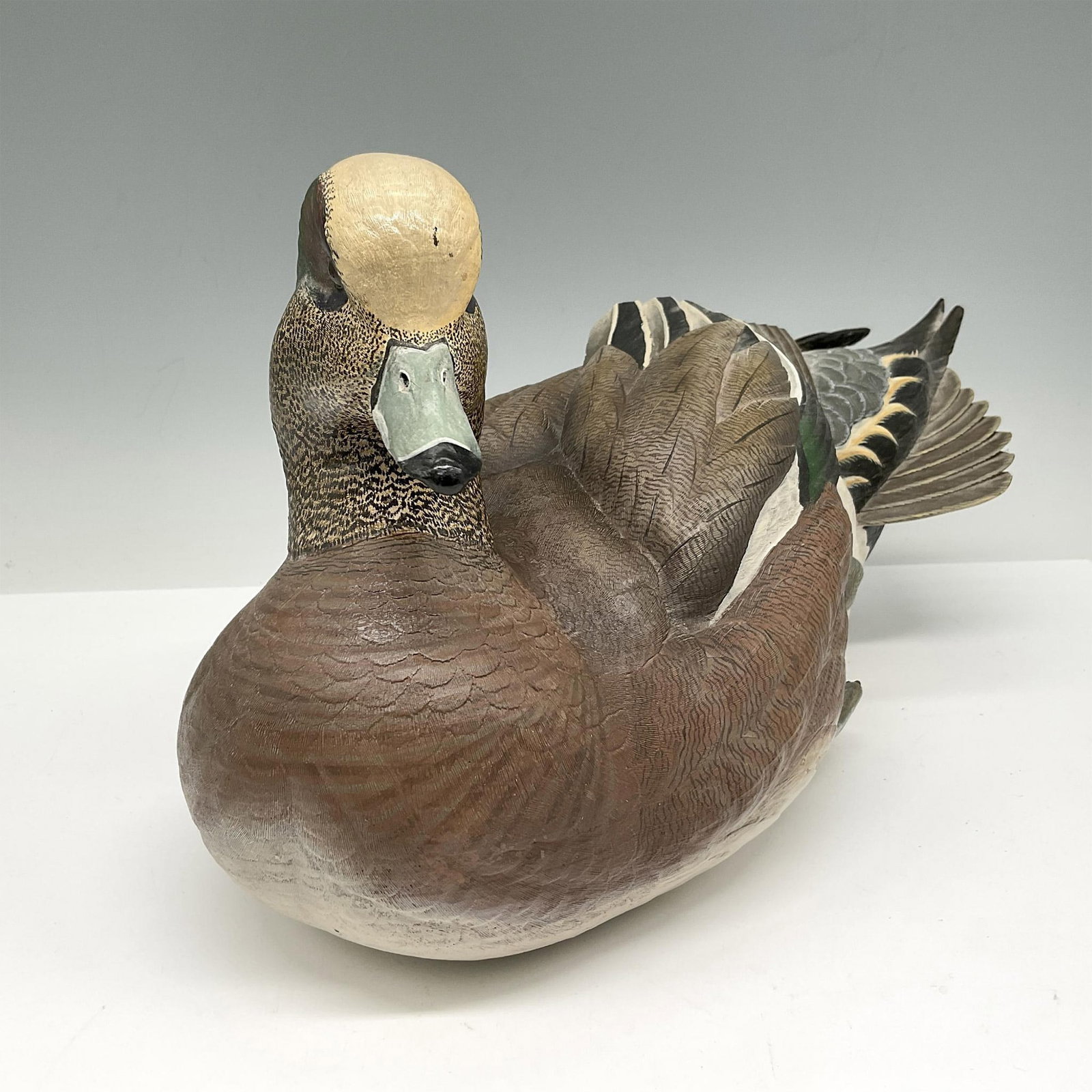 American Widgeon Decoy Woodcarving by Sam Nottleman: Hand carved and hand painted this widgeon was originally made for Friends of the NRA. Limited edition 613 of 1050. Friends of NRA Certificate of Authenticity sticker. Issued: 20th century Dimensions: 