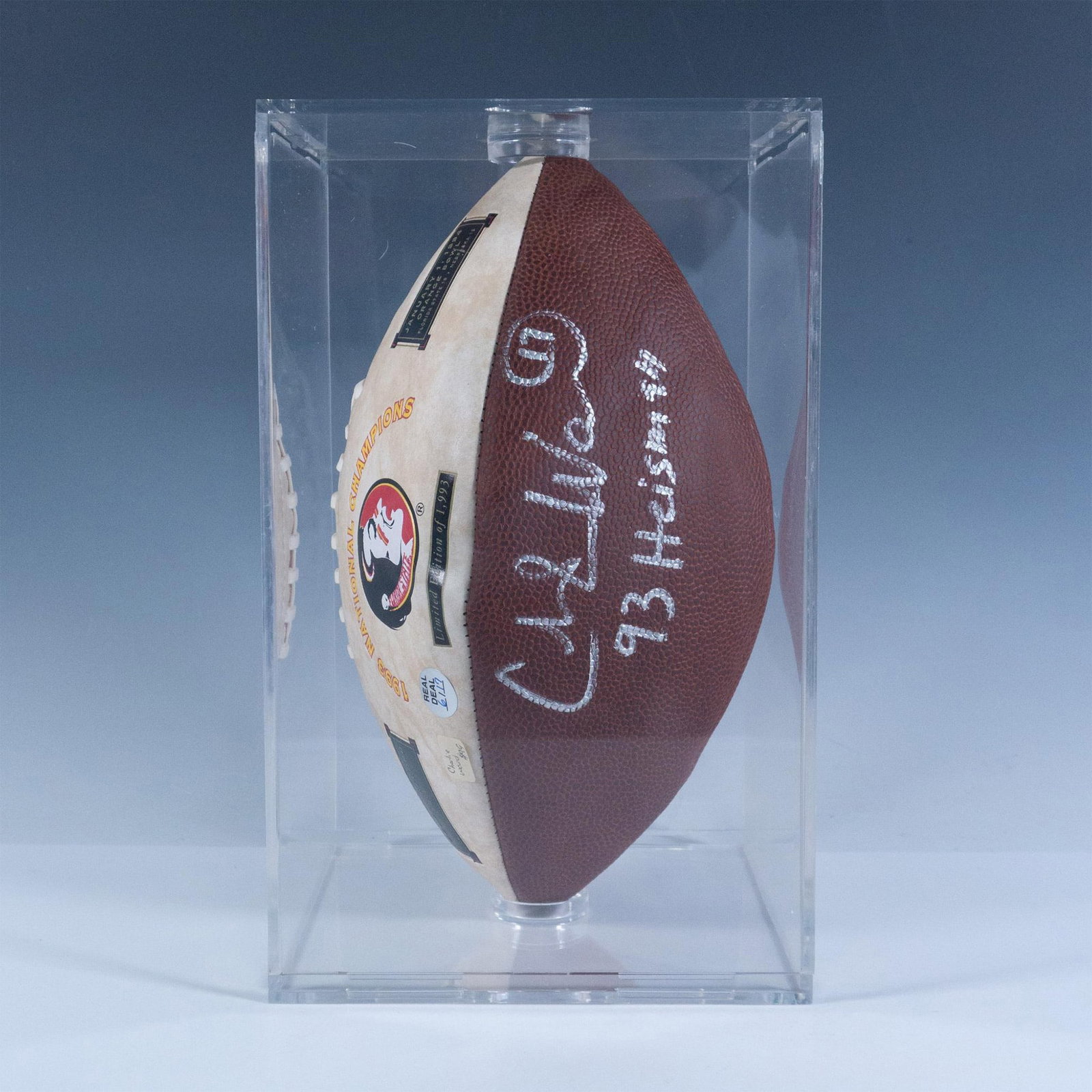 Charlie Ward Seminoles Heisman Recipient Signed Football: This Florida State University Seminoles ball is a limited run of just 1993 and has the team's logo in the portion below the laces and championship statistics in the portion above it. It is signed in s