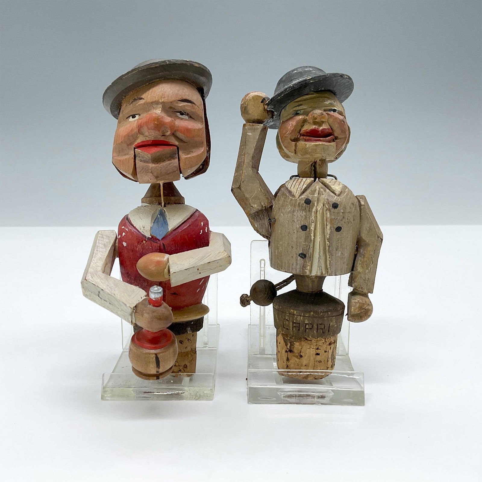 2pc Carved Mechanical Figural Stoppers (1 of 3)