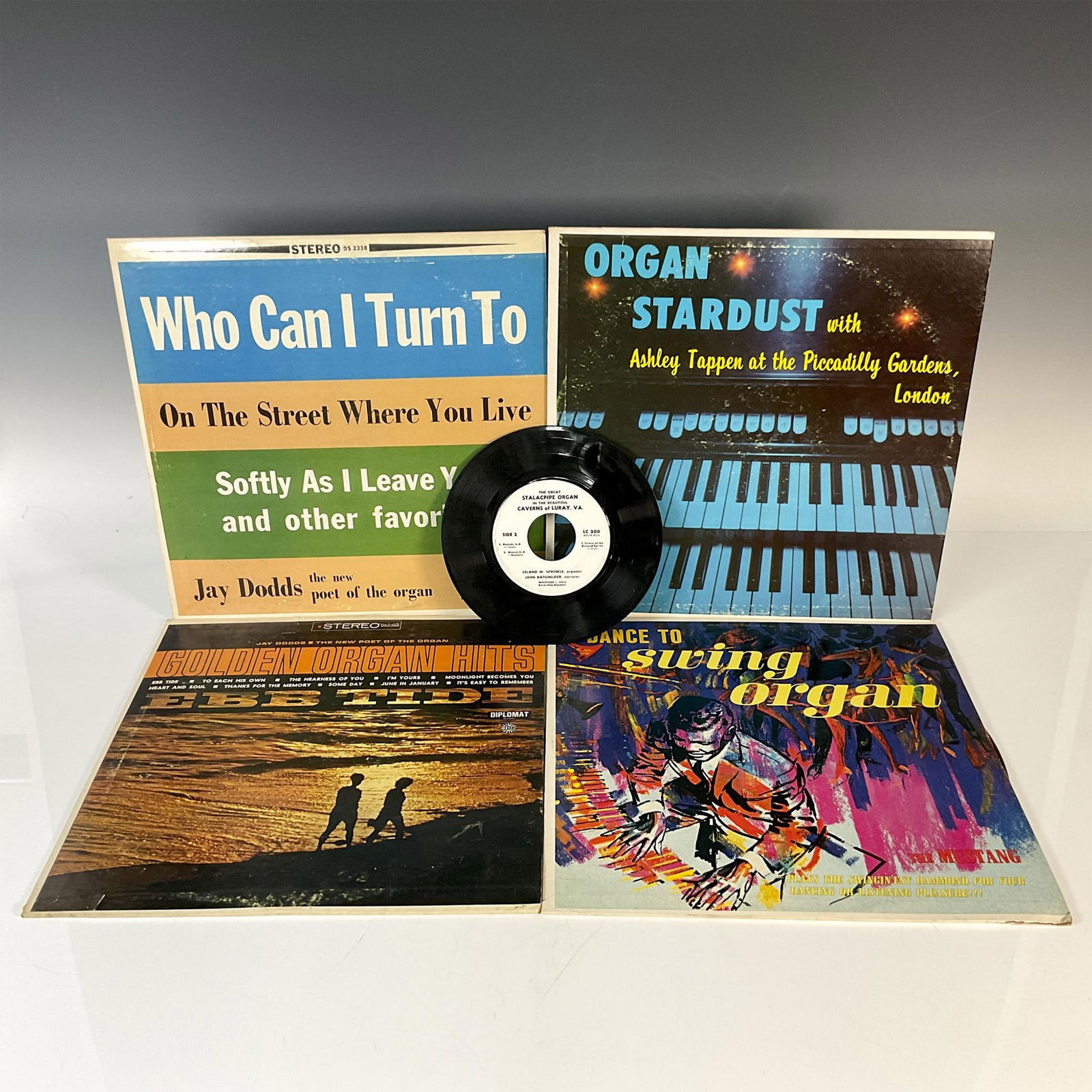 5pc Vintage Organ Performance Vinyl Records: A collection of vintage records; 4 records are 12-inch with original sleeve, and 1 record is 7-inch. Albums includes The Great Stalacpipe Organ, Organ Stardust, Dance To Swing Organ, Golden Organ Hits