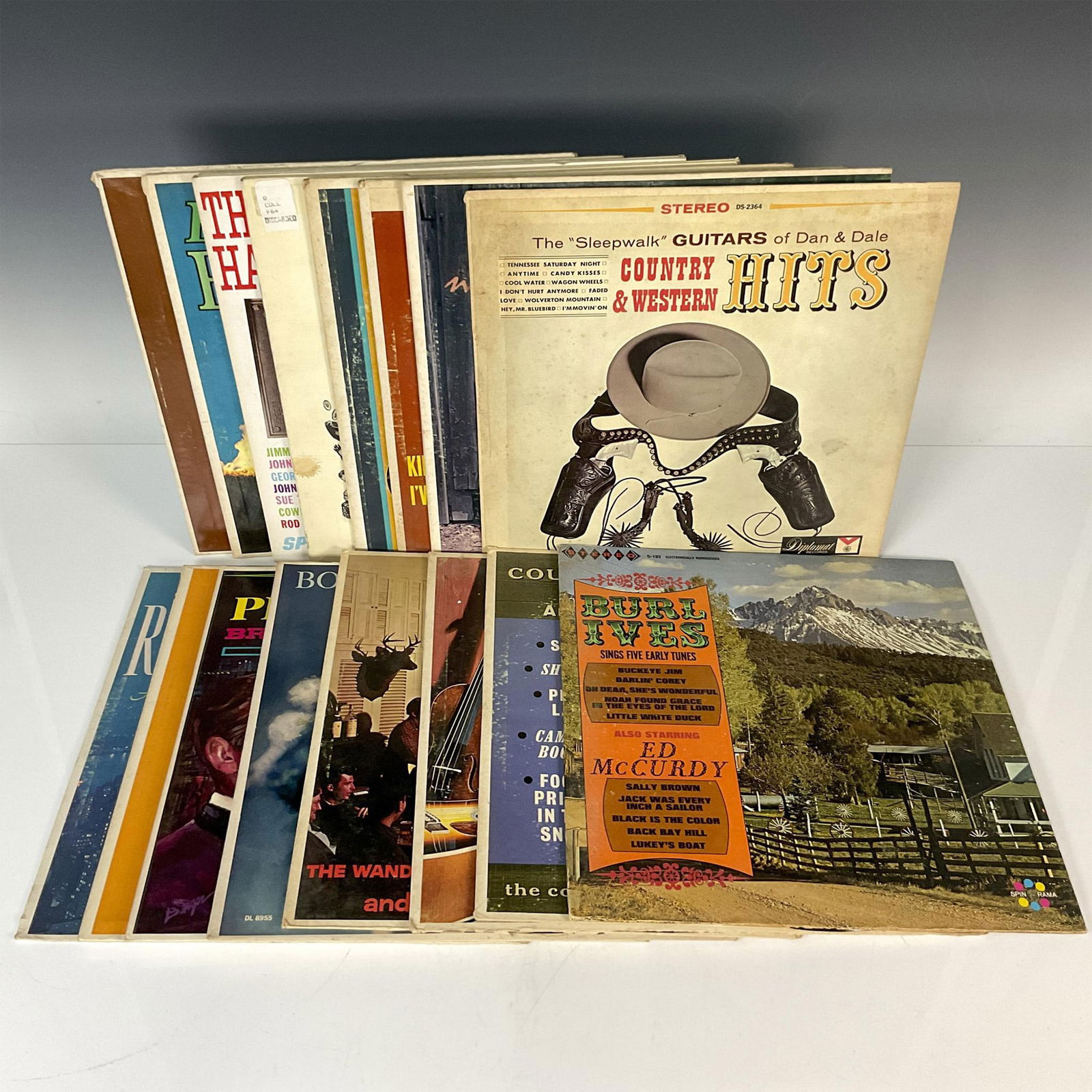 16pc Bluegrass & Country Music Vinyl LPs: Lot includes - Old Country Music in a New Land, Country Music Hall of Fame, Bluegrass Banjos, Country Hits, Bobby Bond, Million Seller Country Hits, Folk Songs, Country & Western Hits, Burl Ives, Coun