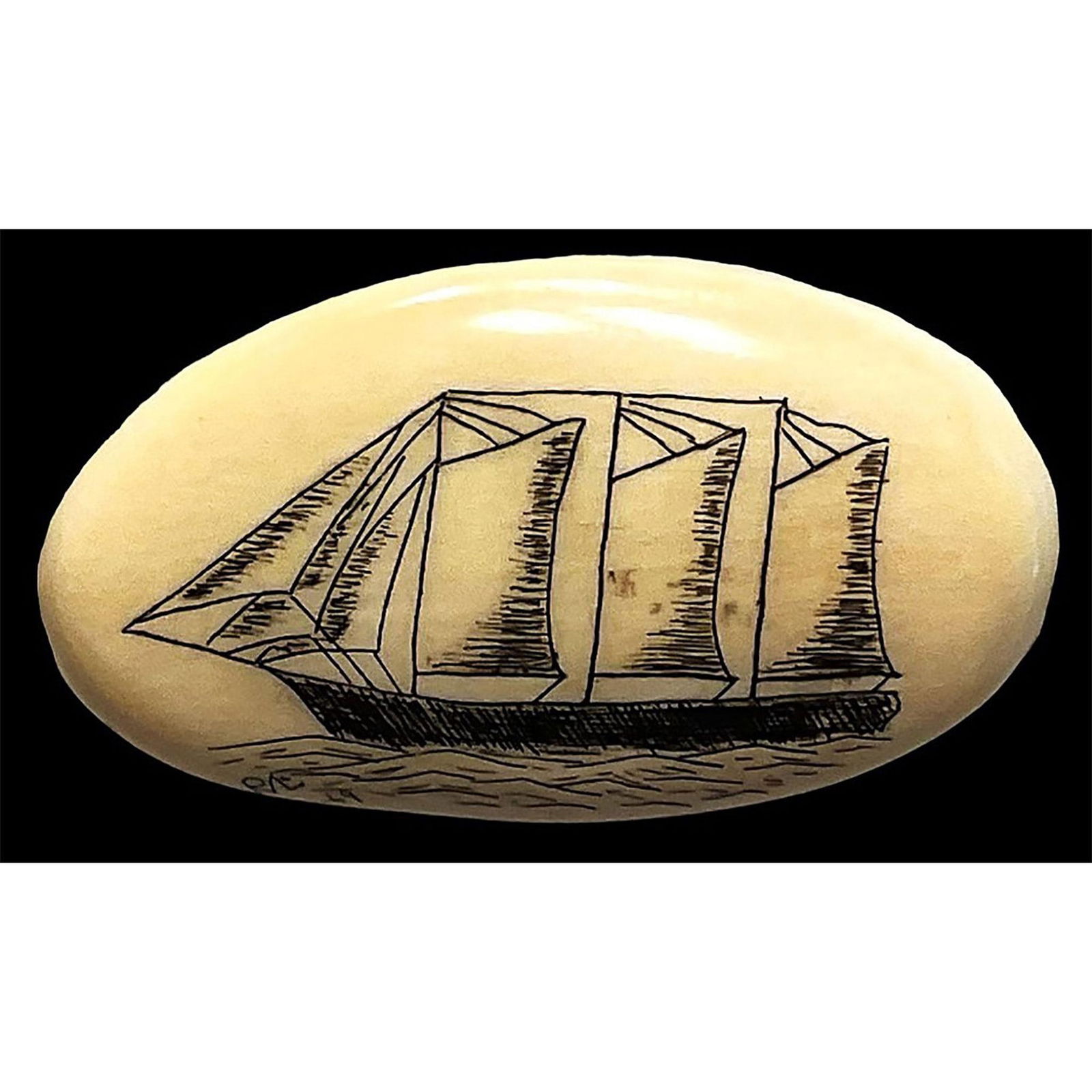 A division three hand engraved natural material button (1 of 3)