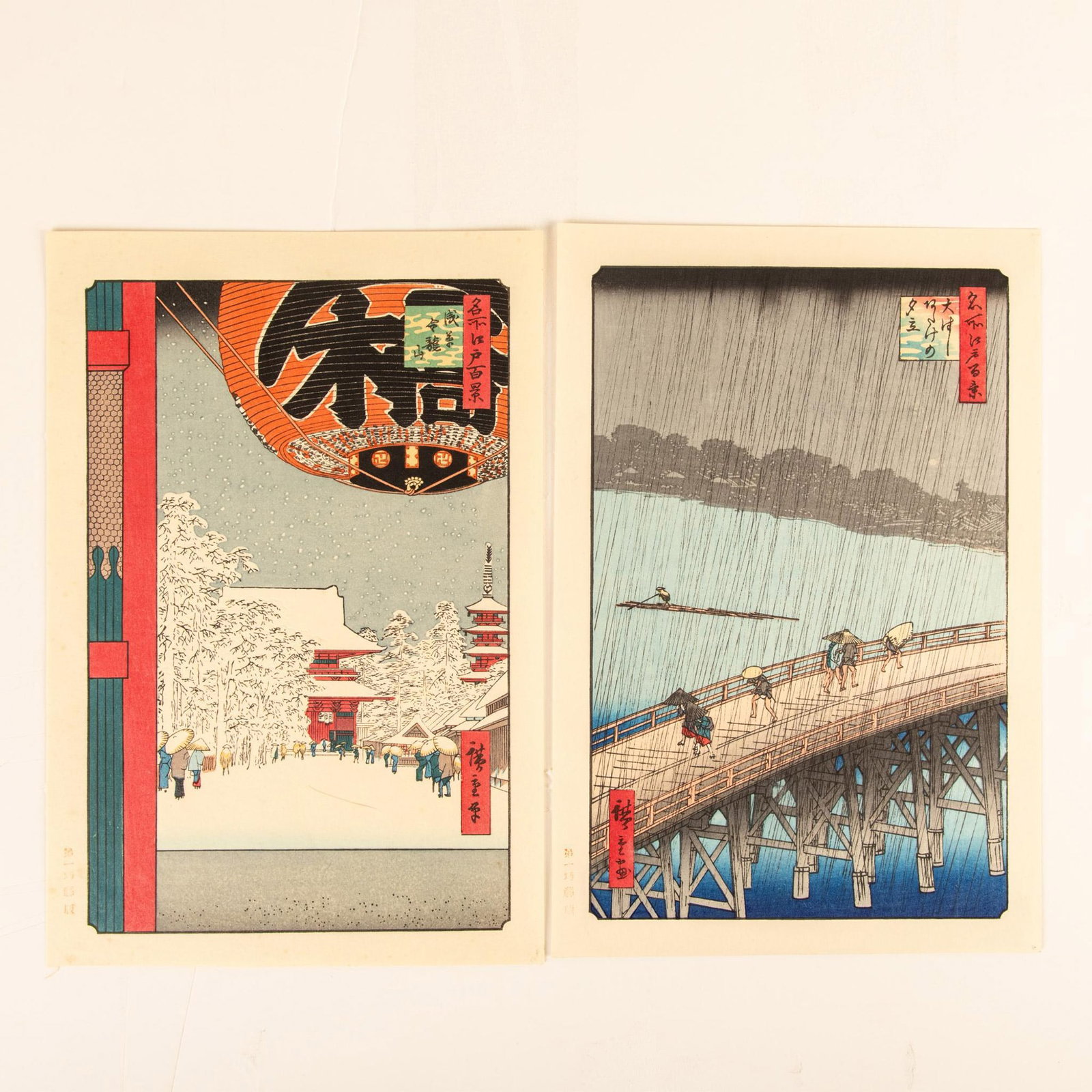 Hiroshige (After) Set of Two Original Color Ukiyo-e Woodcuts: Beautiful set of two Ukiyo-e woodcuts on paper after 19th century Japanese Master Hiroshige's series One Hundred Famous Views of Edo. The color woodcuts include Kinryusan Temple at Asakusa and Sudden 