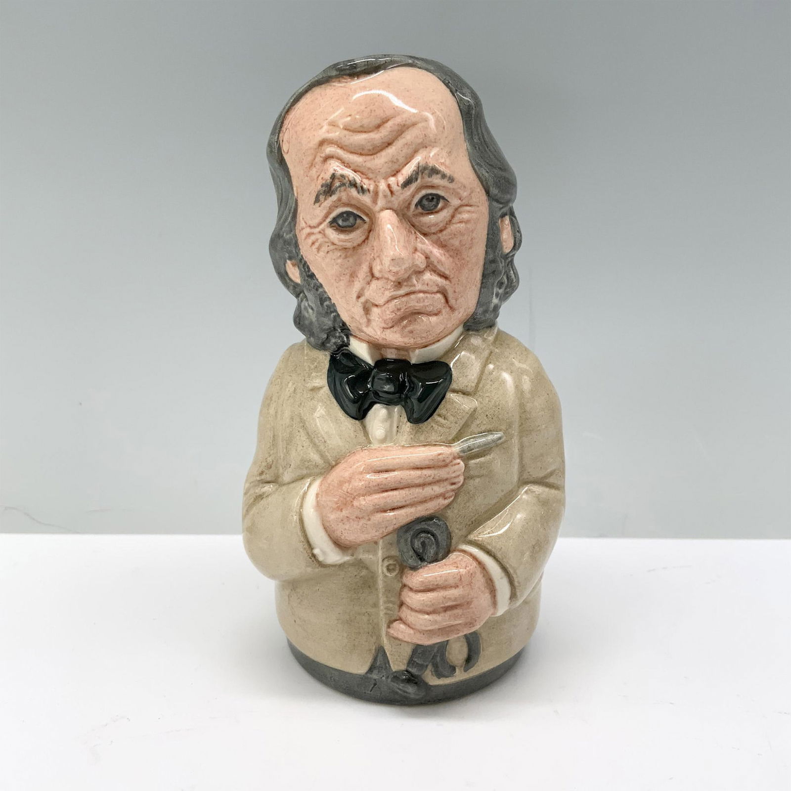 Dr. Pulse the Physician D6723 - Royal Doulton Toby Jug: Royal Doulton backstamp. Artist: William K. Harper Issued: 1985 - 1991 Dimensions: 4"H Manufacturer: Royal Doulton Country of Origin: England