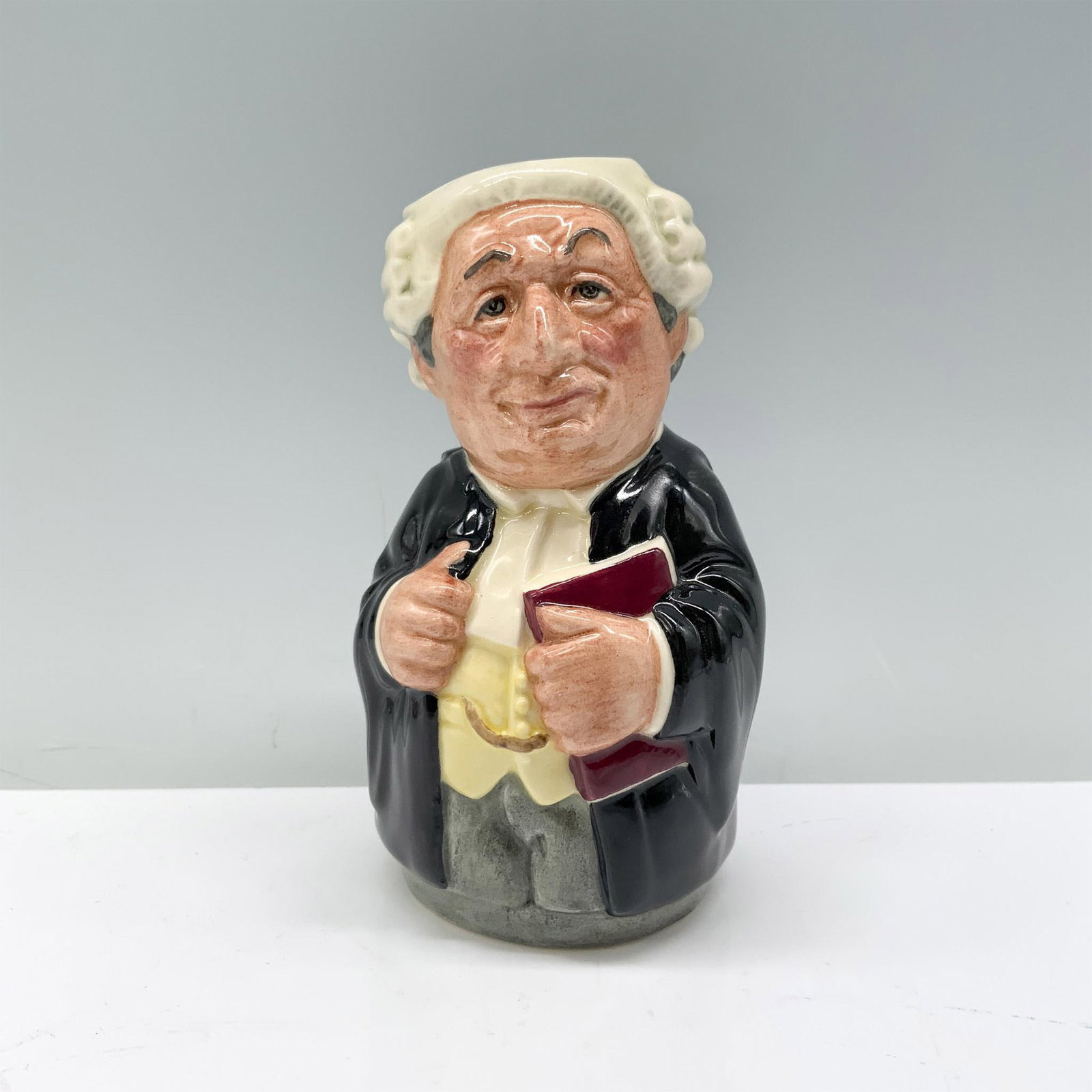 Mr. Litigate the Lawyer D6699 - Royal Doulton Toby Jug: Royal Doulton backstamp. Dimensions: 4"H Manufacturer: Royal Doulton Country of Origin: England