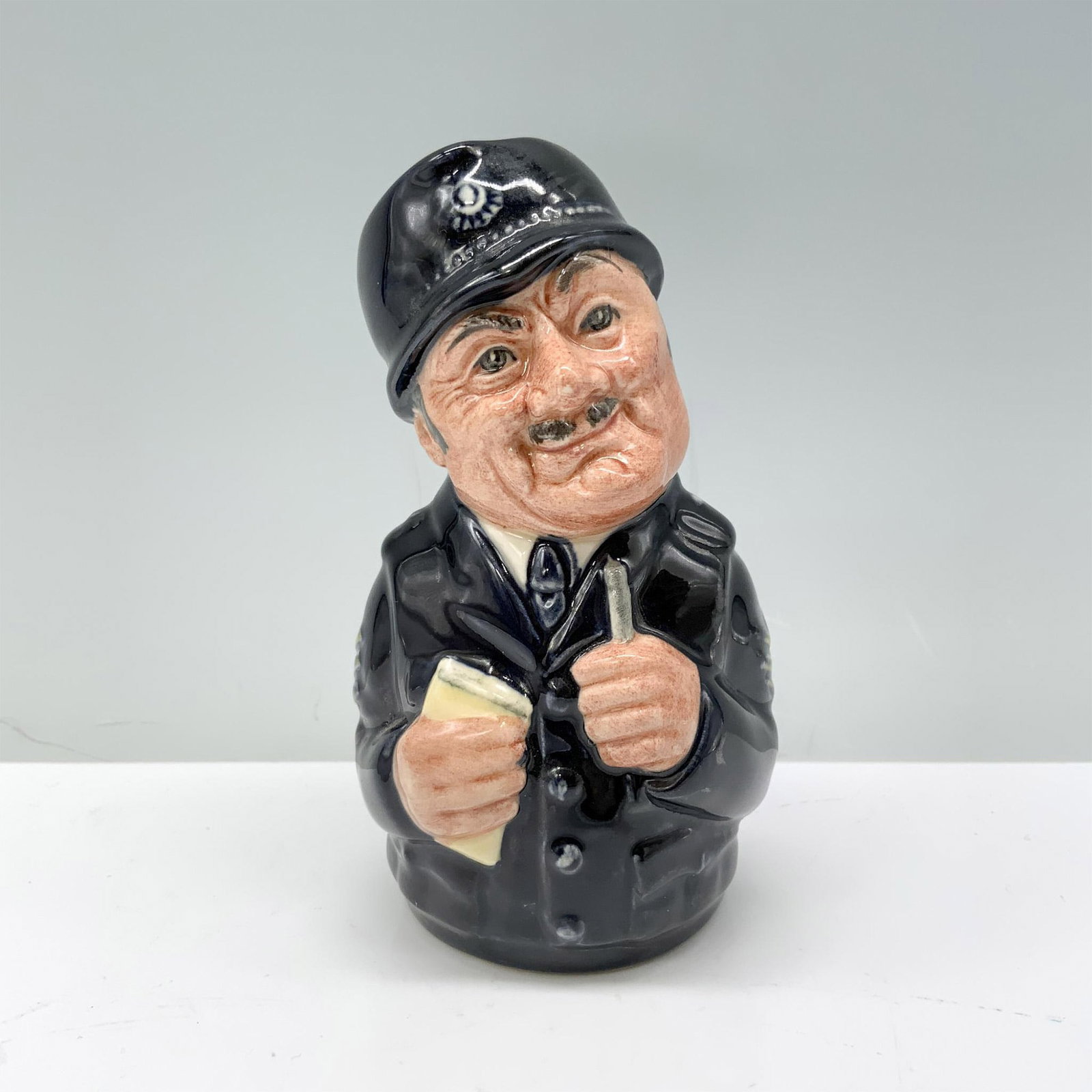 Sgt. Peeler the Policeman D6720 - Royal Doulton Toby Jug: Royal Doulton backstamp. Dimensions: 4"H Manufacturer: Royal Doulton Country of Origin: England