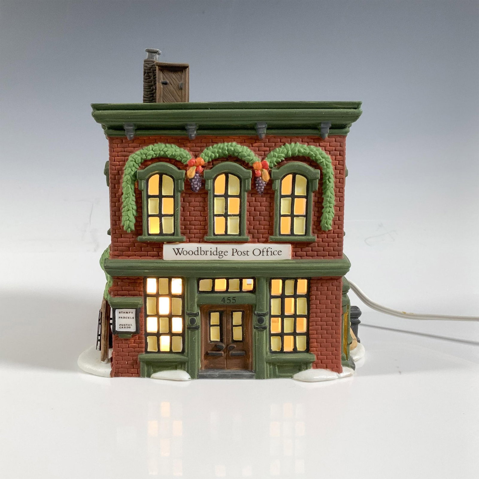 Dept 56, New England Woodbridge Post Office: This festive intricate New England lit village build is beautiful. This figurine was made in 1995 out of ceramic and porcelain material. Hand made and hand-painted. Backstamped New England Village Ser