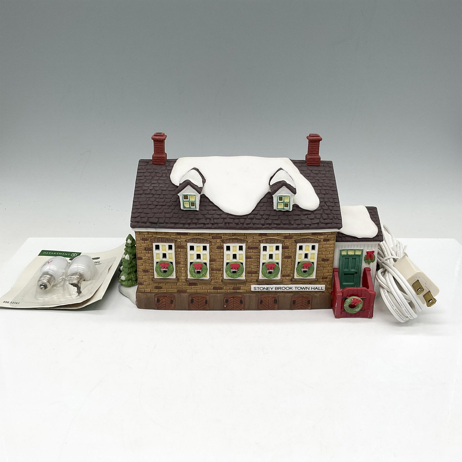 Department 56 Porcelain Stoney Brook Town Hall: Part of the New England Village Series, building is decorated for the holidays with wreaths on windows and doors. Hall lights up with included bulb and light switch. Department 56 impressed mark. This