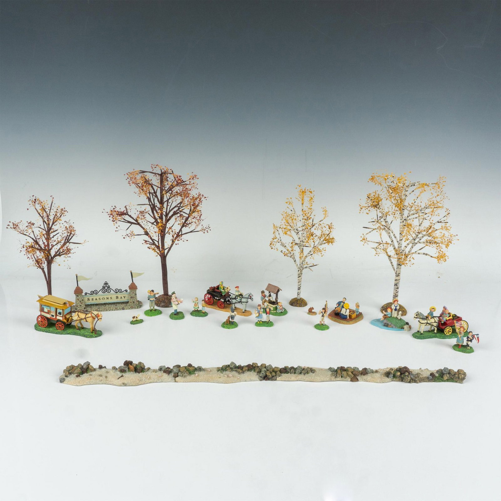11pc Dept 56 Seasons Bay Figurines and Accessories Grouping: This Seasons Bay grouping includes Back from the Orchard #53320, The Garden Cart #53327, I'm Wishing #53309, 4th of July Parade #53317, Fishing in the Bay #53313, Park Street Lights #53366, Seasons Ba
