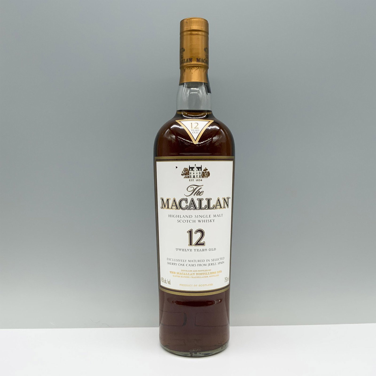 Macallan 12 Year Highland Single Malt Scotch, Sealed: Bottle is sealed, full. The Macallan Sherry Oak is an exquisite Single Malt matured exclusively in carefully selected Sherry oak casks from Jerez, Spain, offering a satisfyingly complex flavor profile