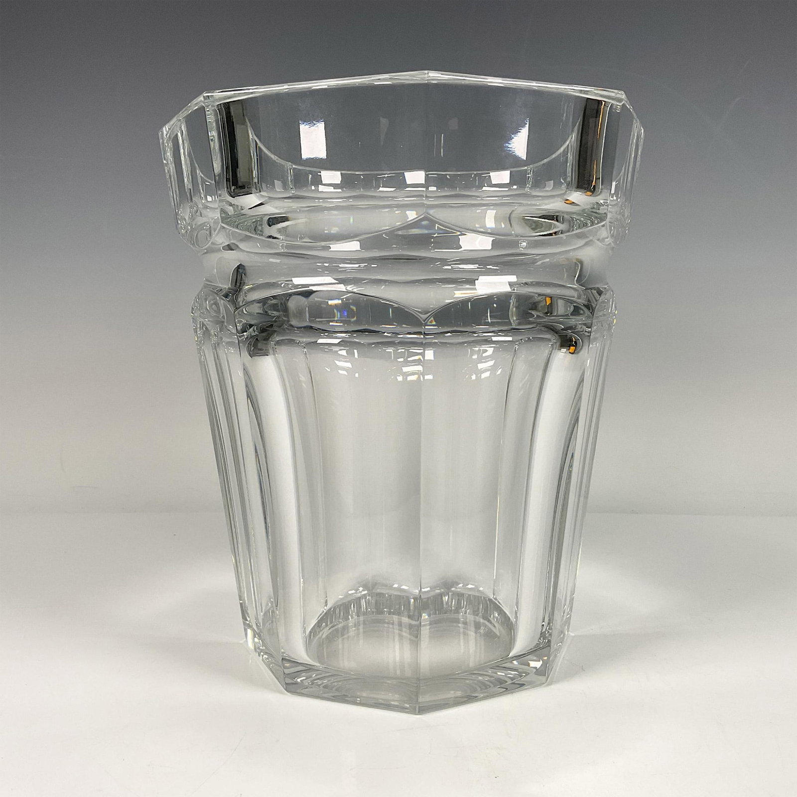 Baccarat Crystal Wine Cooler: Stunning thick clear crystal. Boast a symmetrical cut design that creates a beautiful light effect. Baccarat acid mark on base. Weight: 10lb. Issued: 20th century Dimensions: 9''H x 7.5''dia Manufactu