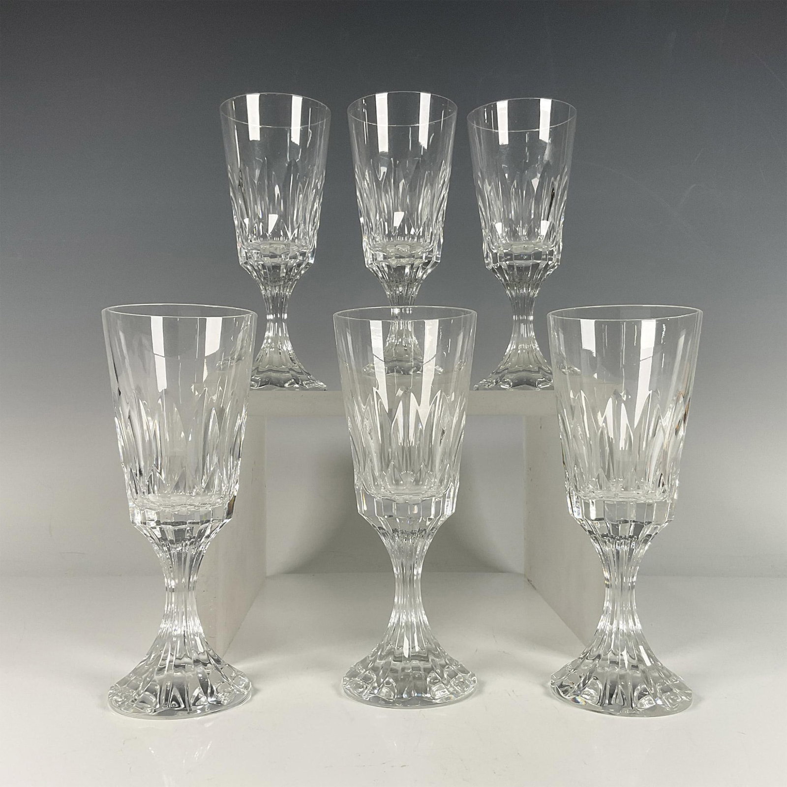 6pc Baccarat Crystal White Wine Glasses, Assas: Beautiful clear crystal. Showcasing the Assas pattern creating a beautiful facetted effect. Baccarat acid backstamp. Issued: 20th century Dimensions: 6.5''H x 2.5''dia, Each Manufacturer: Baccarat Cou