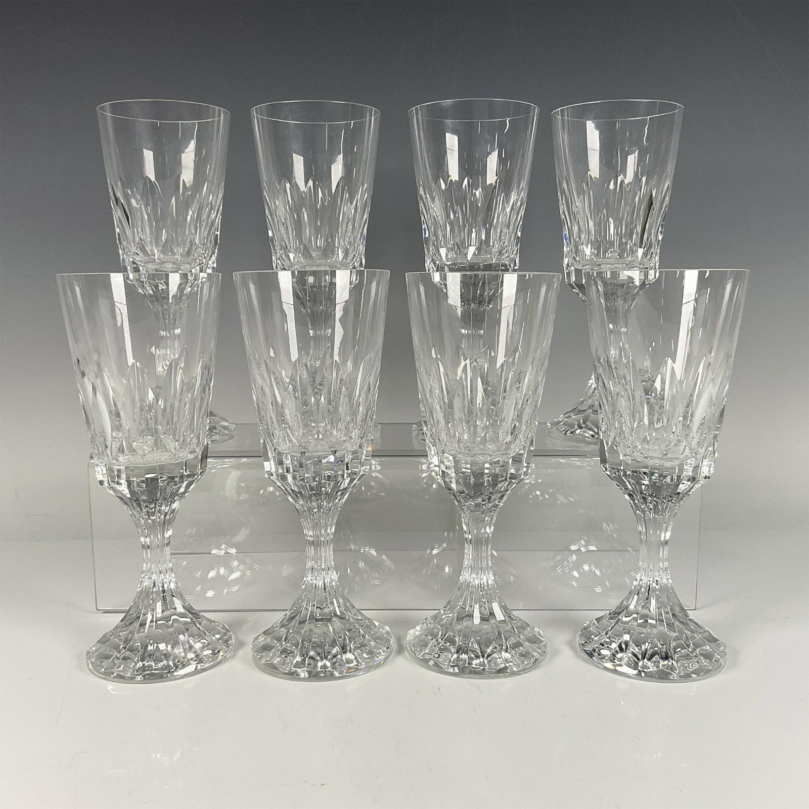 8pc Baccarat Crystal Wine Glasses, Assas: Beautiful clear crystal. Showcasing the Assas pattern creating a beautiful facetted effect. Baccarat acid backstamp. Issued: 20th century Dimensions: 7.5''H x 3''dia, Each Manufacturer: Baccarat Count
