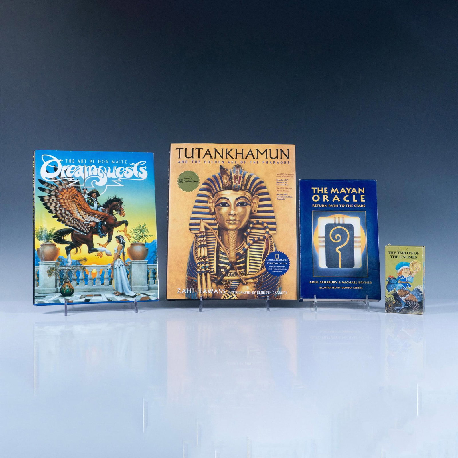 4pc Group Of Metaphysical And Historical Books: Great education and entertainment ahead. First, is Tutankhamen And The Golden Age Of The Pharaohs (2005) and includes a CD narrated by Omar Sharif. Next, is Dreamquests: The Art Of Don Maitz (1993) wi