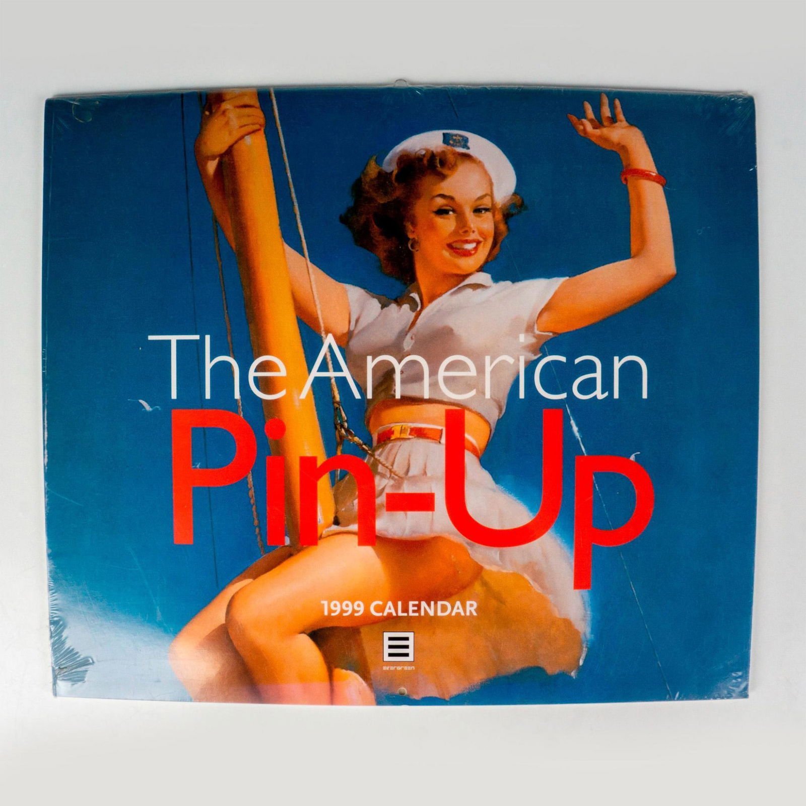 Collectible Calendar, The American Pin-Up 1999: Turn of the century twelve month calendar with full color images depicting American pin-up paintings from a variety of classic pin-up artists including Earl Mac Pherson, Gil Elvgren, and Edward Runci.
