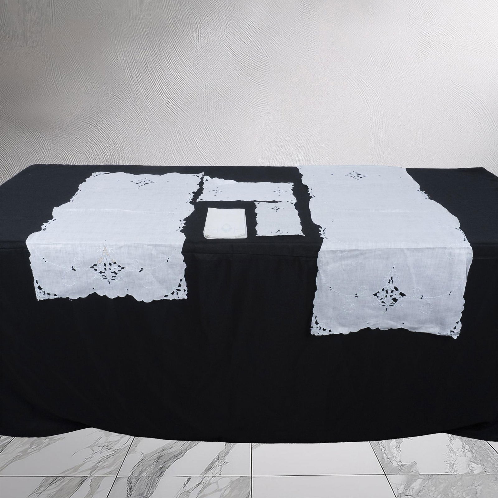 5pc Vintage Blue & White Embroidered Linen Table Accessories: Lot includes - white tissue linen napkin with blue embroidered design (17"L x 12"W); 2 doilies; short table runner (31"L x 16.5"W) and long table runner (40"L x 17"W). Issued: 20th century Dimensions: