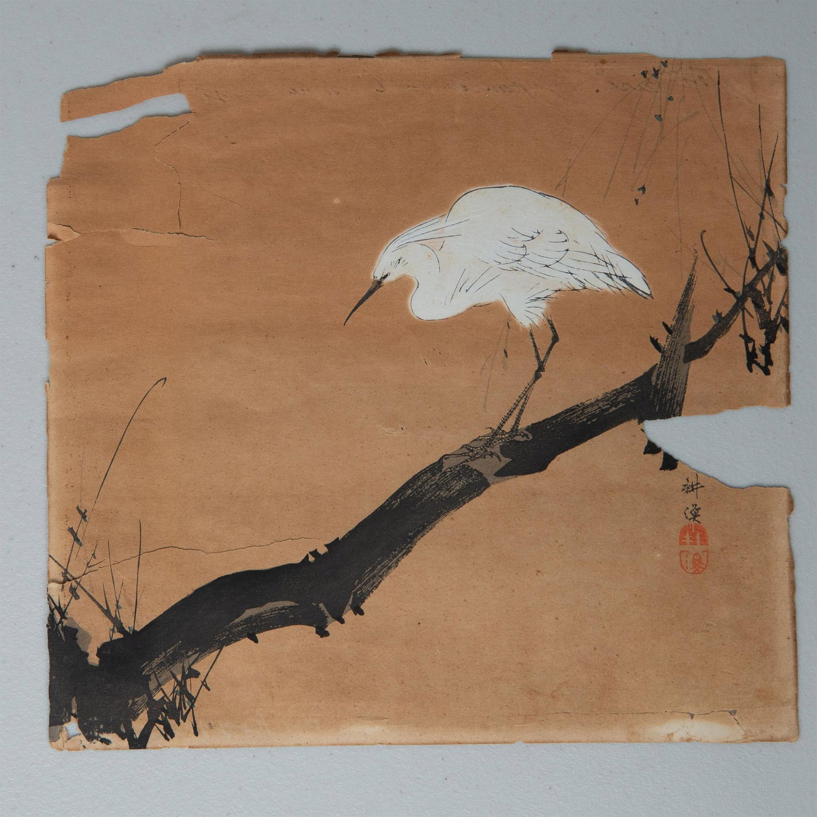Attr. Tsukioka Kogyo (Japanese, 1869-1927) Woodblock Print: Antique woodblock print on paper. Print depicts a heron perched upon a branch. Heron is colored white in what appears to be gofun white pigment based on the medium's translucence. Impression from wood