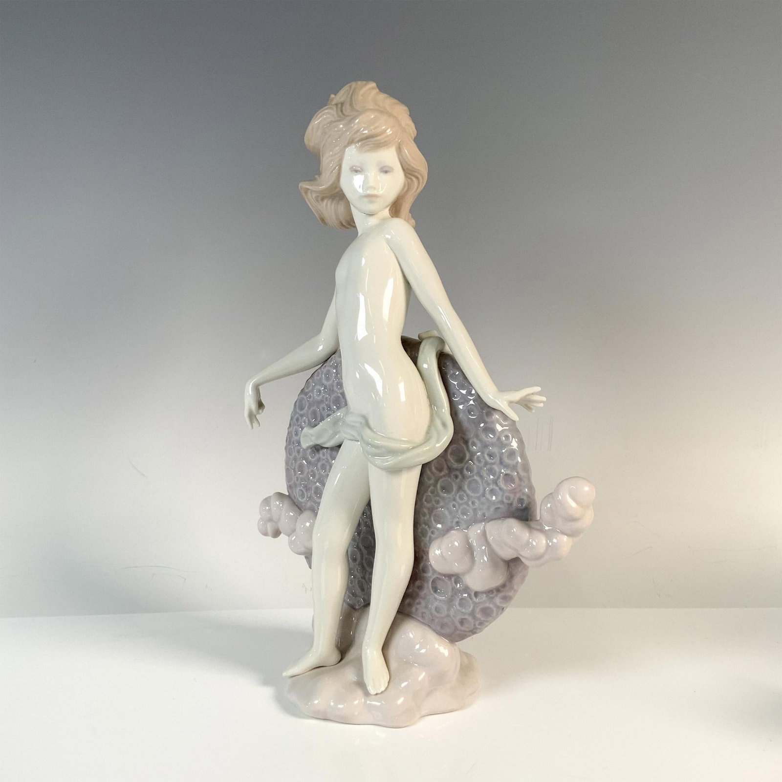 Blue Moon 1001435 - Lladro Porcelain Figurine: Lovely young girl standing in front of the moon. Lladro backstamp. Artist: Jose Puche Issued: 1983 - 1987 Dimensions: 5.75"L x 3"W x 9"H Manufacturer: Lladro Country of Origin: Spain