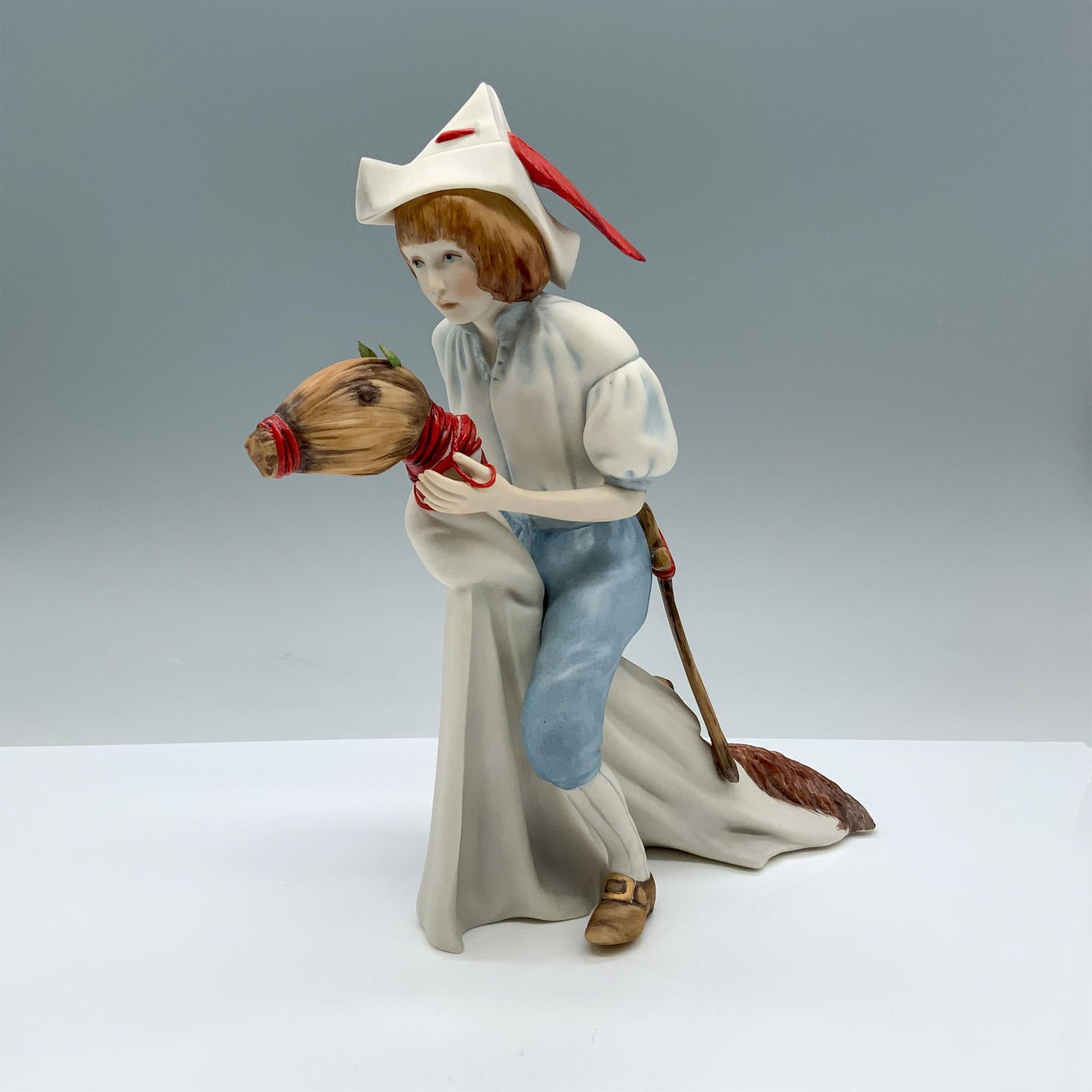 Cybis Porcelain Figurine, Yankee Doodle Dandy: Hand painted bisque porcelain. Cybis mark on the bottom. Issued: 1970s Dimensions: 8.5"L x 3.5"W x 9"H Manufacturer: Cybis Country of Origin: United States