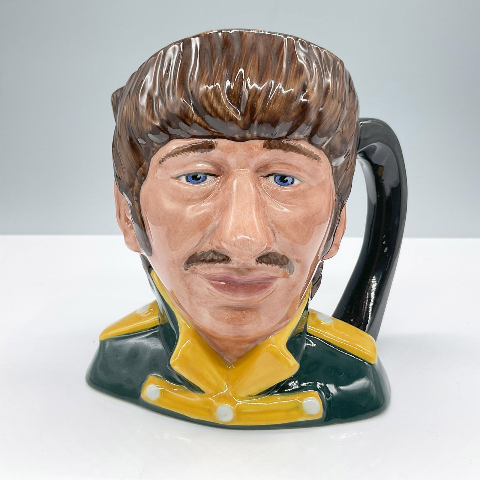 Ringo Starr D6726 - Odd Size - Royal Doulton Character Jug: Royal Doulton backstamp. Artist: Stanley J. Taylor Issued: 1984 - 1991 Dimensions: 5.5"H Manufacturer: Royal Doulton Country of Origin: England